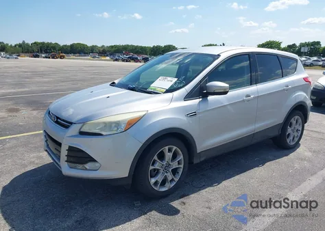 2013 Ford Escape Sel z USA, uszkodzony, nr VIN 1FMCU0H98DUC79356